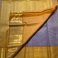 Close-up of the gold zari border on the lavender Kanchi Pattu saree