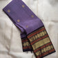 Lavender handwoven pure silk Kancheepuram saree with deep navy border