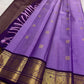 Lavender purple Kanjeevaram silk saree — gold zari butta body close-up