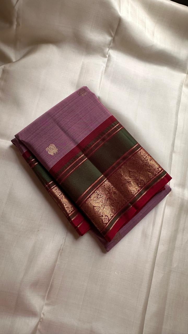 Dusty lavender pure silk Kanchi Pattu saree with gold zari Butta motifs, full drape view