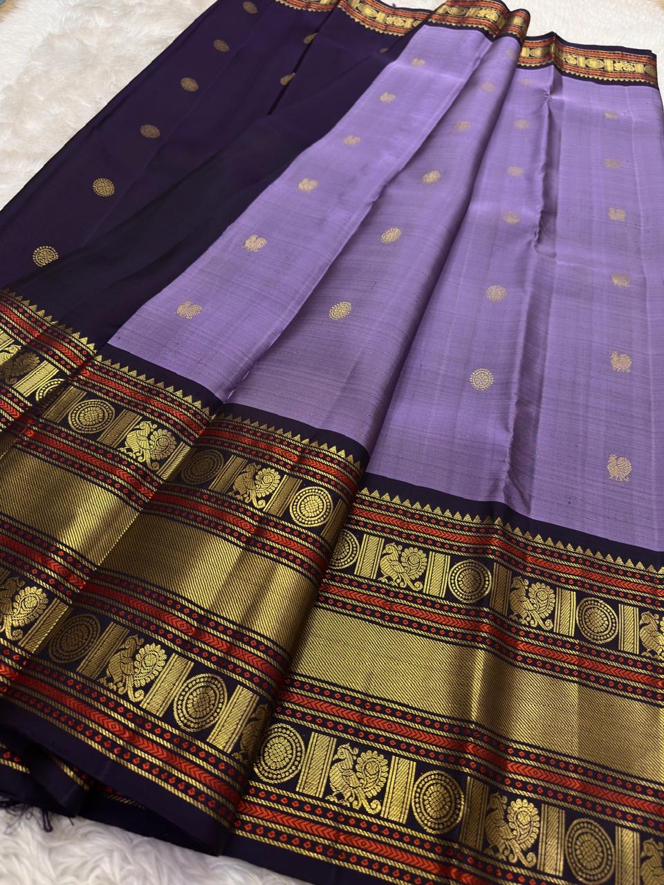 Lavender Korvai Kancheepuram silk saree with navy border and vermilion accents