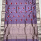 Lavender purple Pattu Silk Chanderi saree with red floral motifs and silver zari borders