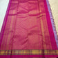 Close view of Lavender Purple Zari Kattam pure silk saree with circular and traditional woven buttas.