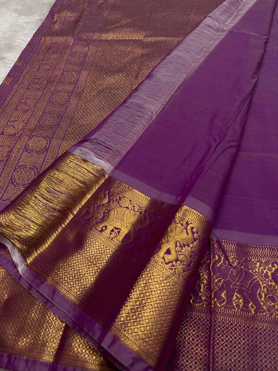 Lavender Pure Silk Kanchipuram saree with Mayil border