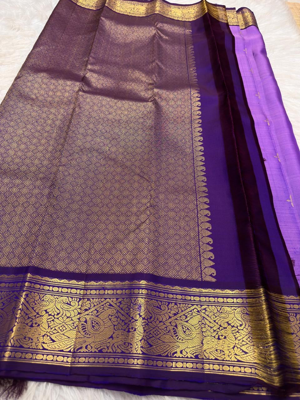 Lavender purple Pure Silk Kanjipuram Butta saree with deep violet border