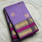 Lavender Kanchipuram silk saree with fine intersecting Zari Kattam checks and woven zari buttas.