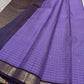 Lavender muthu kattam body with contrasting deep plum pallu and zari woven border, spread out