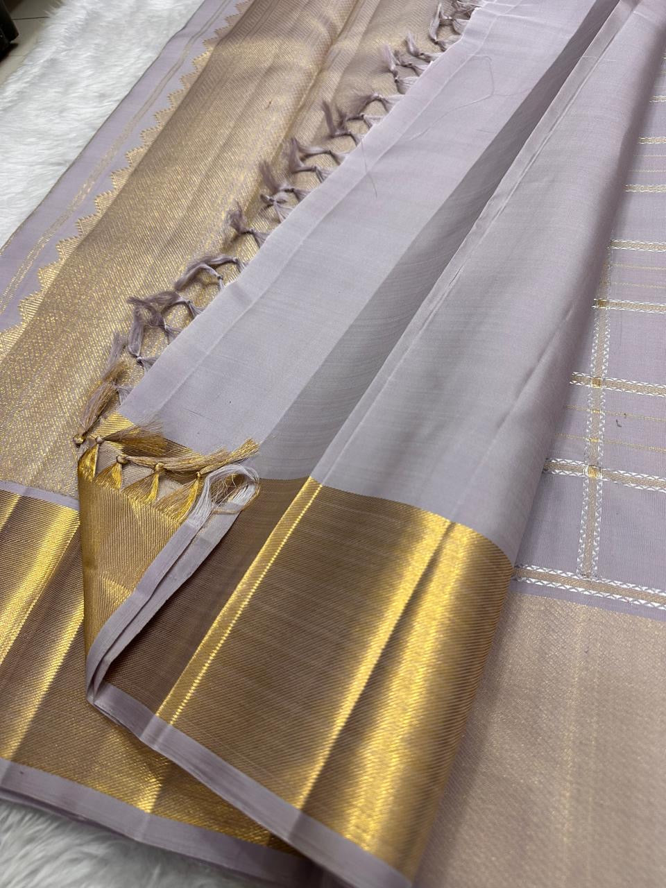 Lavender smoke grey Kanchipattu silk saree rich bavanji border
