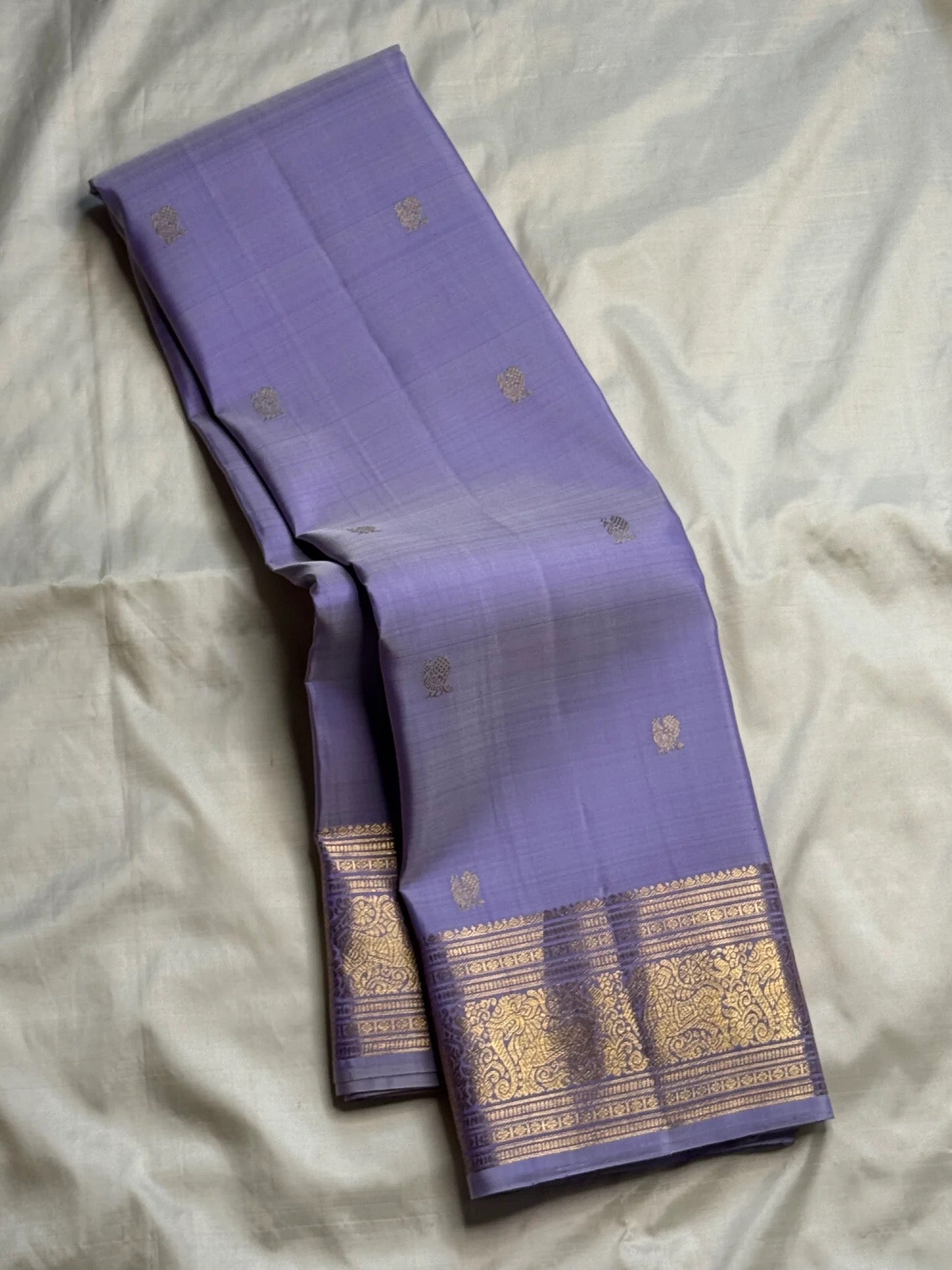 Lavender Violet Handwoven Pure Silk KanchiPattu Saree with Antique Gold Zari Buttas and Ornamental Border