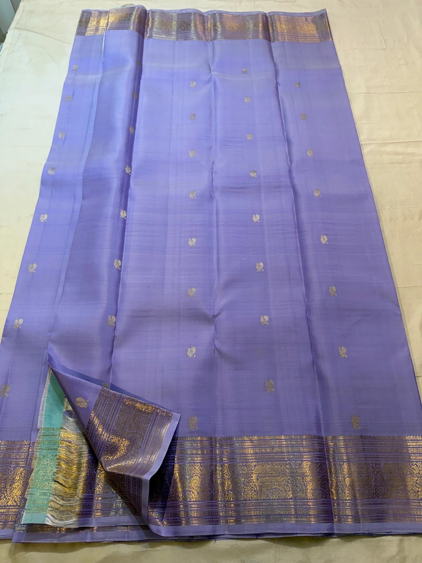 Lavender Violet Handwoven Pure Silk KanchiPattu Saree with Antique Gold Zari Buttas and Ornamental Border