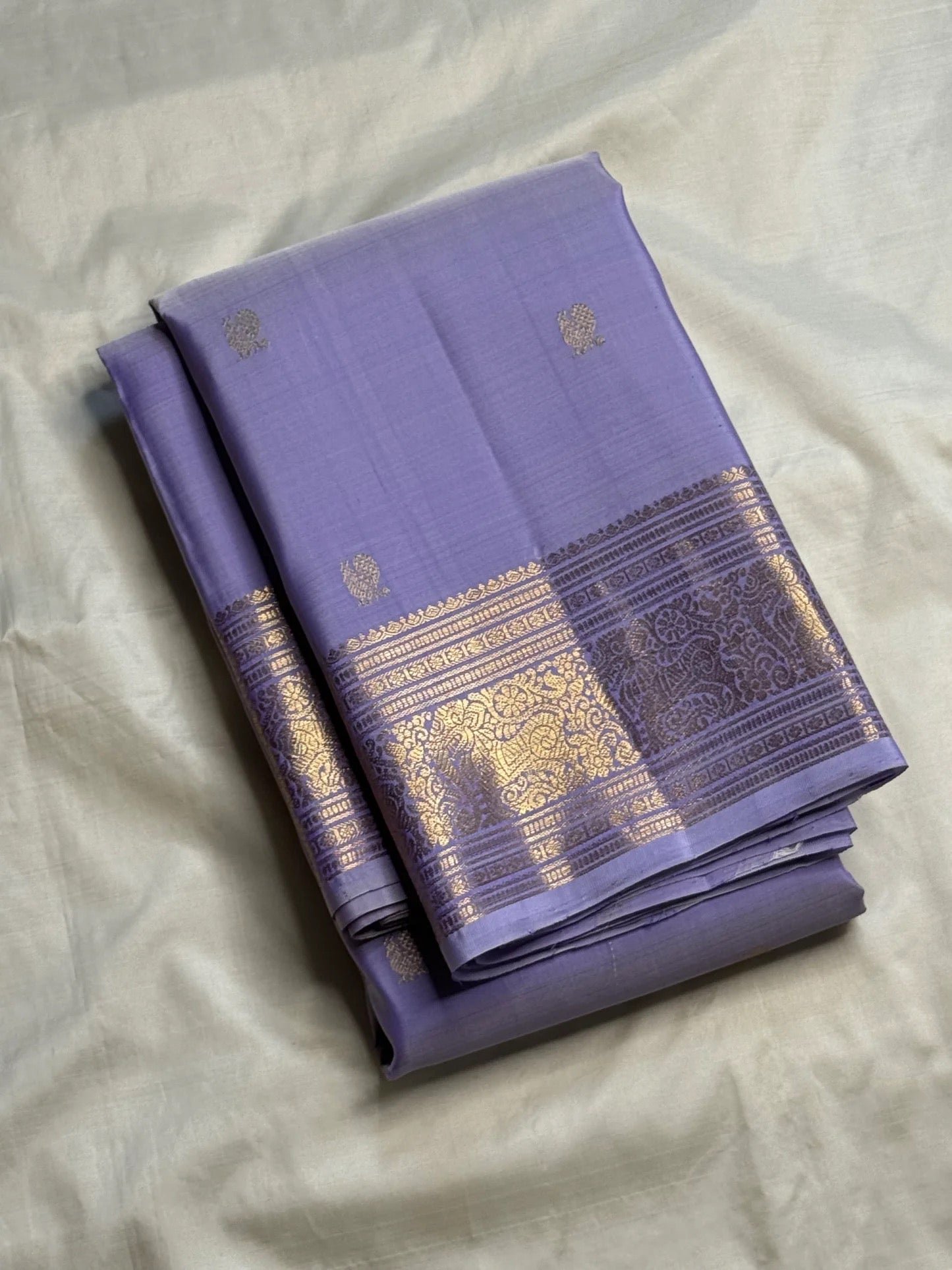 Lavender Violet Handwoven Pure Silk KanchiPattu Saree with Antique Gold Zari Buttas and Ornamental Border