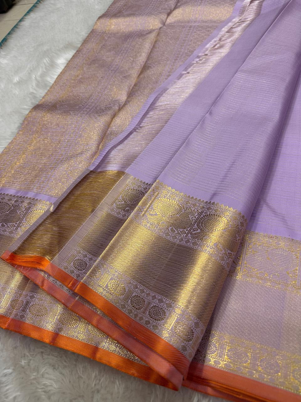 Pastel Lavender Handwoven Pure Silk KanchiPattu Saree with Zari Kattam and Antique Gold Border