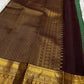 Stylised leaf buttas on the Maragatham Green Kanchipuram silk.