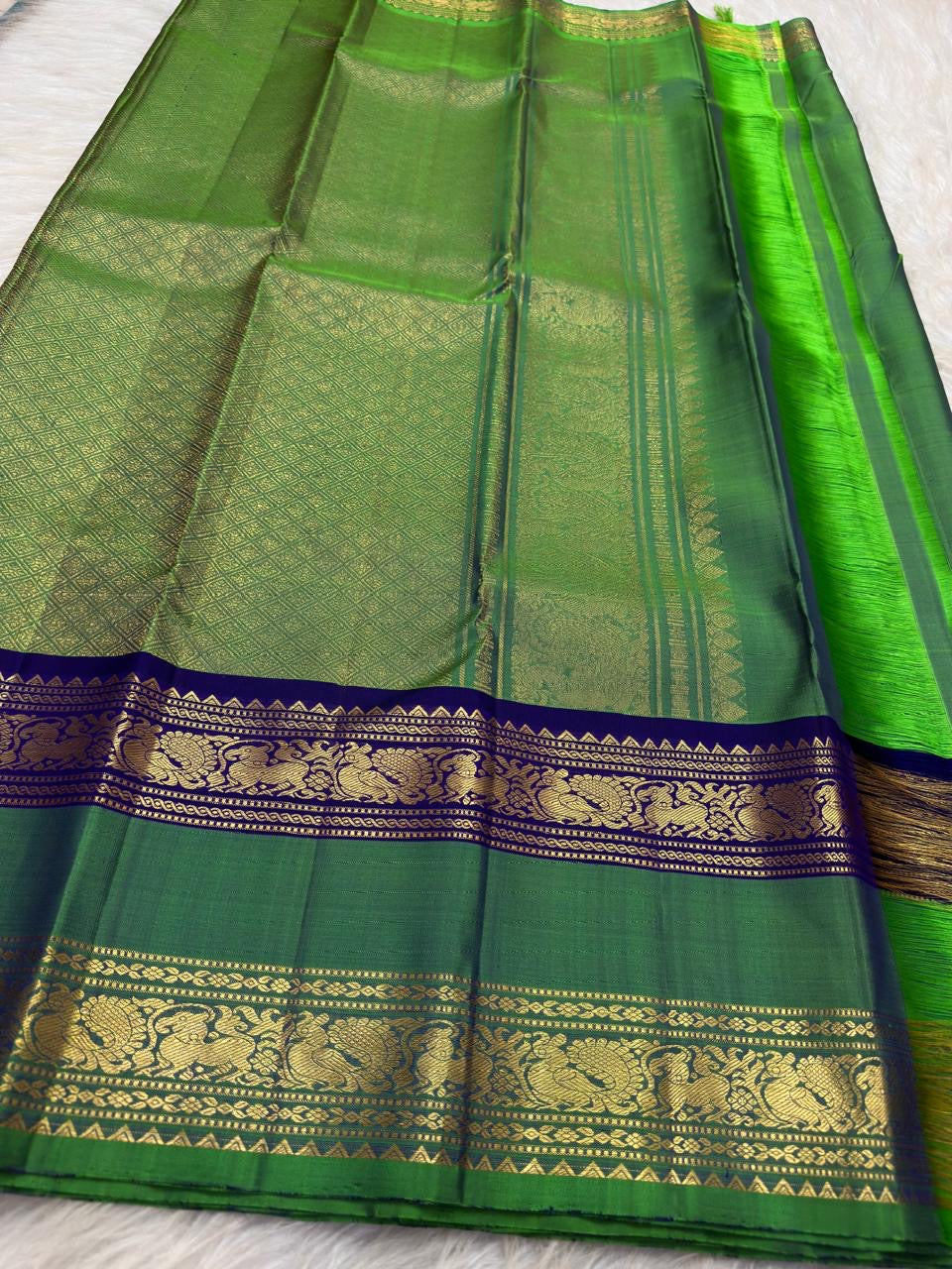 Leaf Green Handwoven Pure Silk Kanjipuram Rettapet Saree with Navy Blue Bird Motif Gold Zari Border