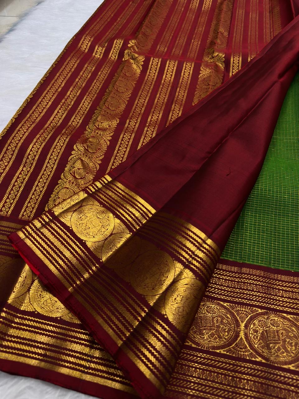 Leaf Green Kanchi Pattu Zari Kattam saree — folded view