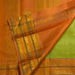 Luminous Vairaoosi zari stripes across a soft green handwoven Kanchipuram silk saree.