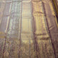Handwoven Pure Silk Kanjivaram showing the diagonal lavender-gold body transitioning into a dense brocade border.