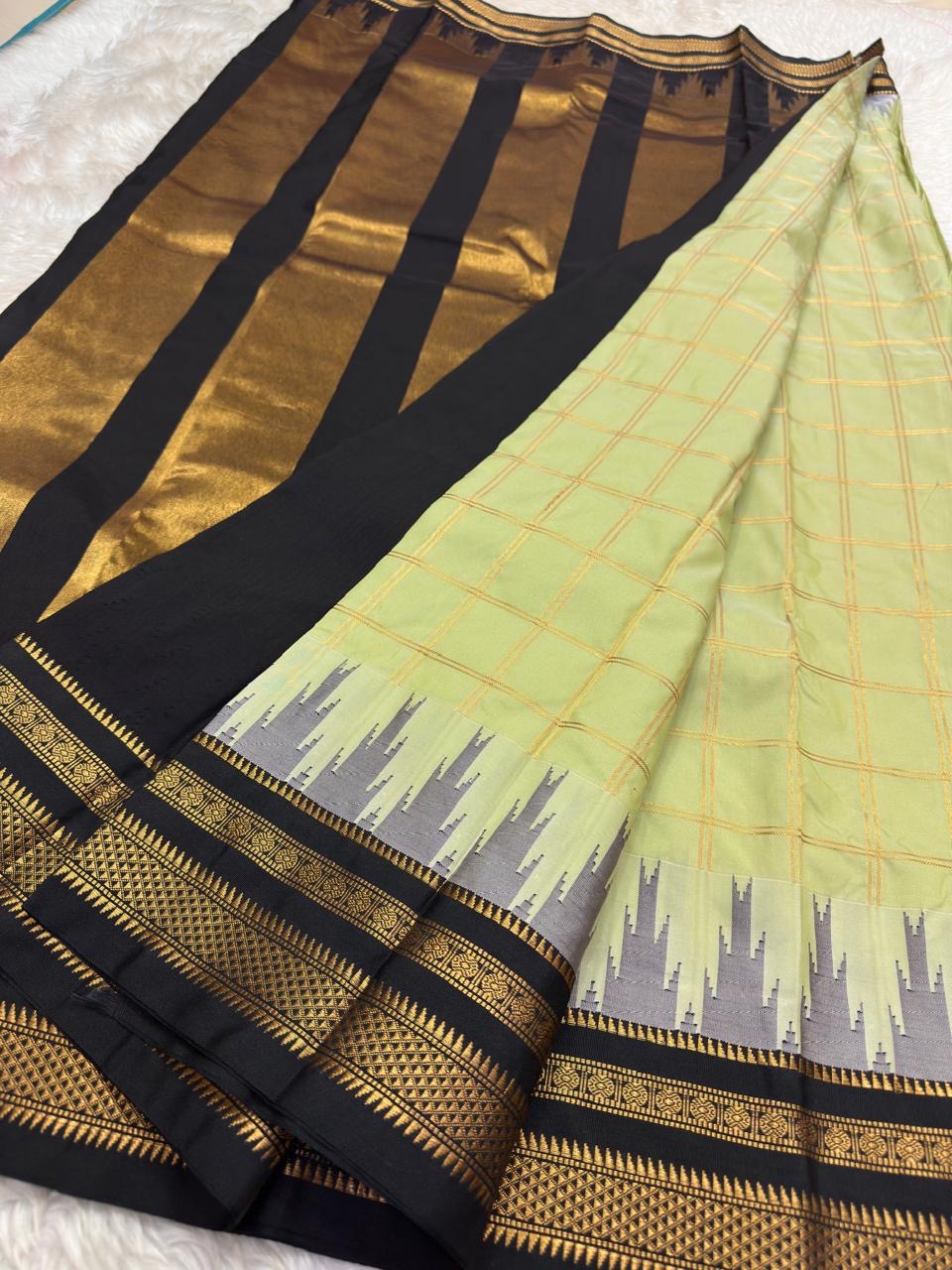 Traditional Arani silk saree with Kanchi Kattam and antique gold zari