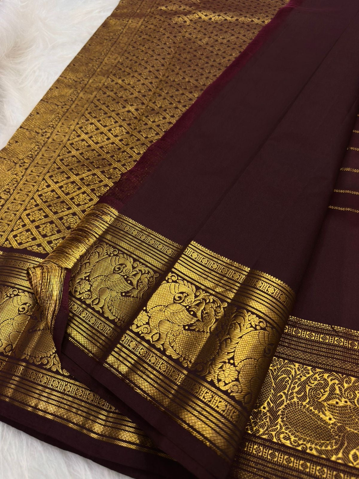 Plum Brown Lightweight Pure Silk Kanchipuram Saree with Mayil Zari Pettu