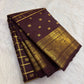 Traditional Lightweight Kanchi Pattu saree with plum-brown body and antique-gold Mayil zari Pettu