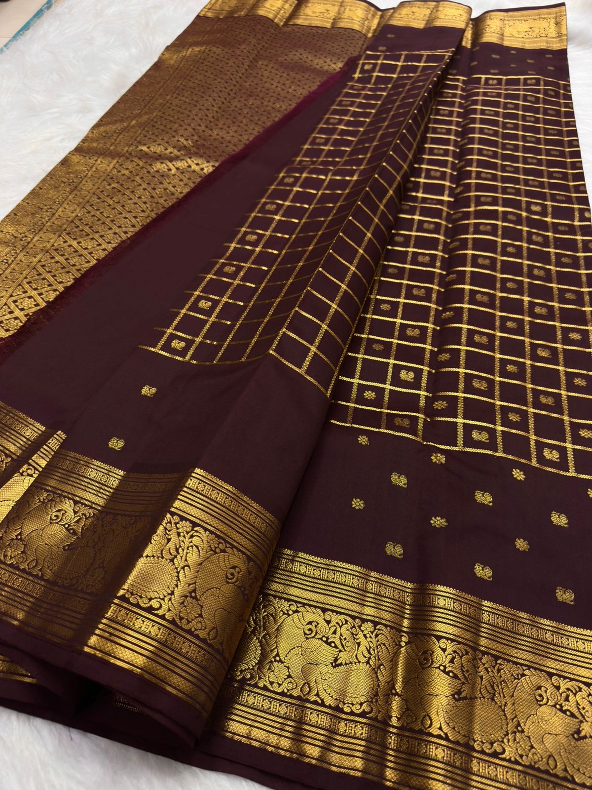 Plum Brown Lightweight Pure Silk Kanchipuram Saree with Mayil Zari Pettu