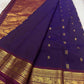 Handwoven violet silk saree with mayil chakram motifs and heirloom-style pallu