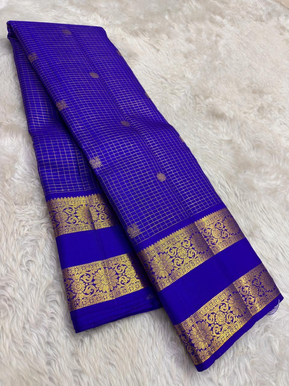 Royal blue handwoven pure silk Kancheepuram saree with Zari Kattam body Mayil Chakram butta and ornate antique gold zari border overview