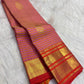 Handwoven Chen buttas spaced across the striped silk body of the peach purple gold Vairaoosi saree.