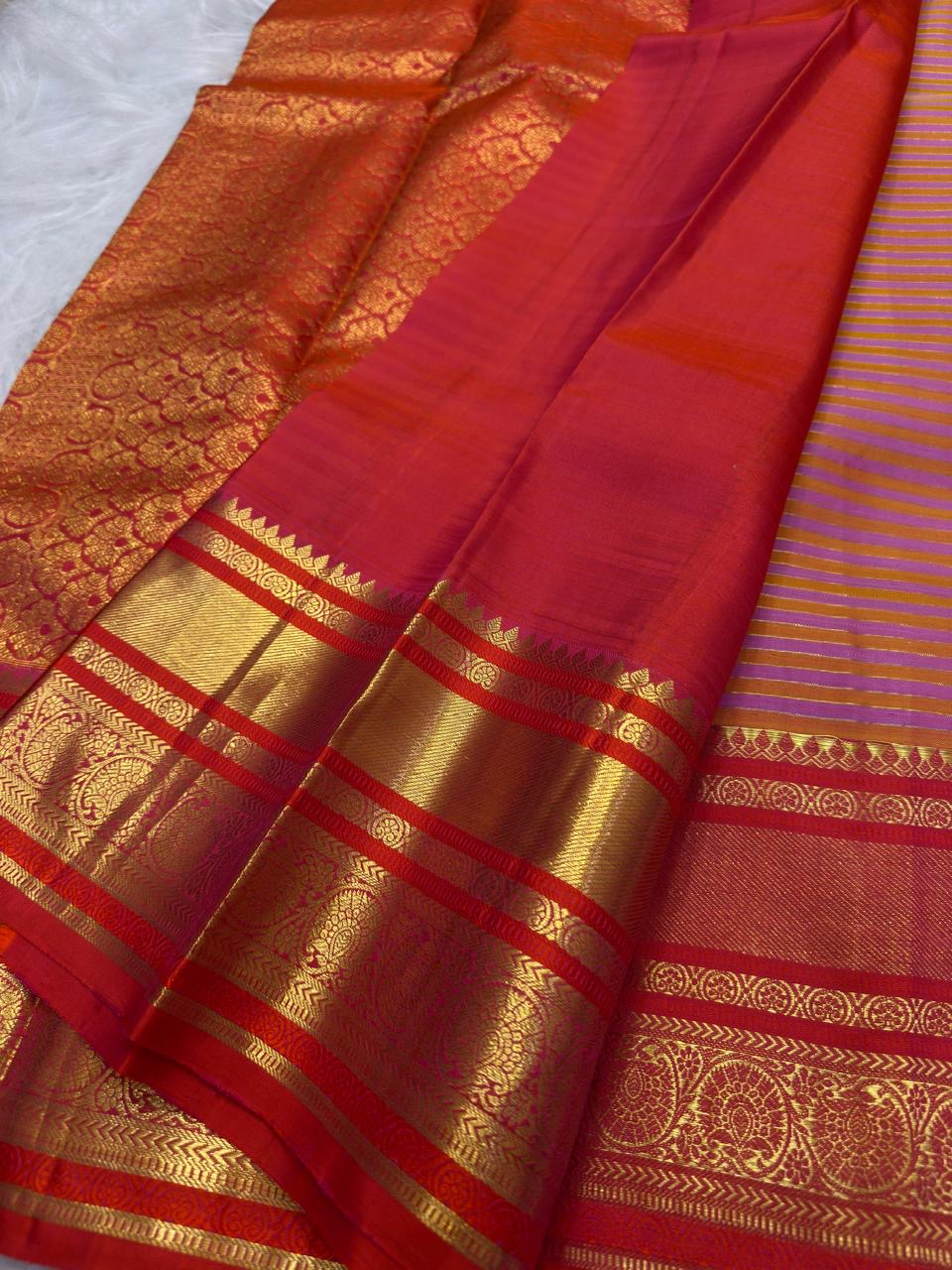 Displayed pallu of Vairaoosi saree showing richly woven zari lattice work and decorative Rudhraksham motifs.