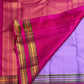 Clear lilac-lavender purple with fine gold checks pure silk Kanchipuram saree, rani pink varisaipet zari border; traditional Zari Kattam weave.
