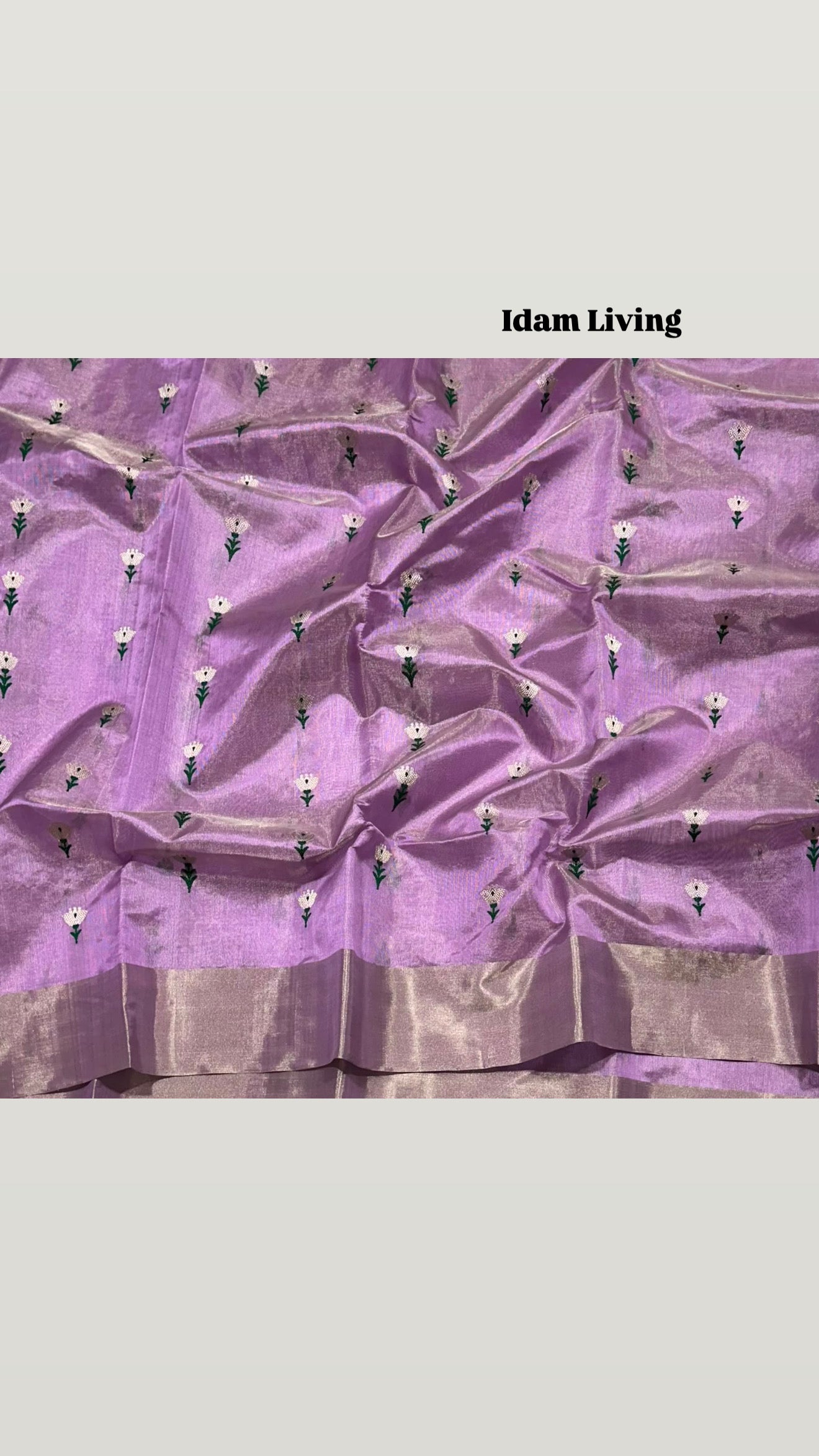 Lilac Tissue Pattu Silk handwoven Chanderi saree draped, showing floral buttas across the body