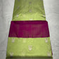 Lime green floral butta Chanderi saree with contrasting magenta borders.