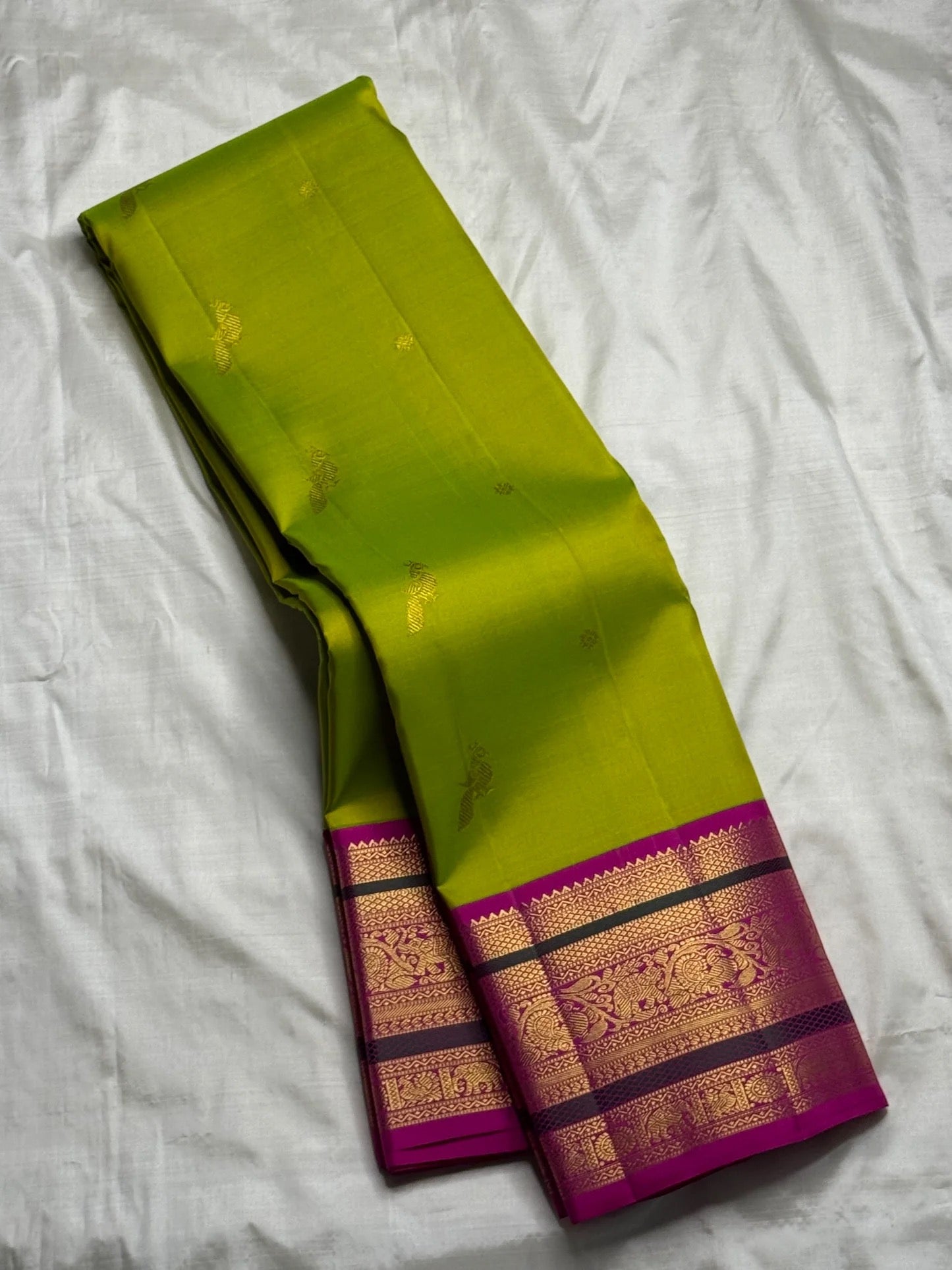 Handwoven parrot green pure silk Kanchipuram saree with mayil butta and silk thread border — Idam Living