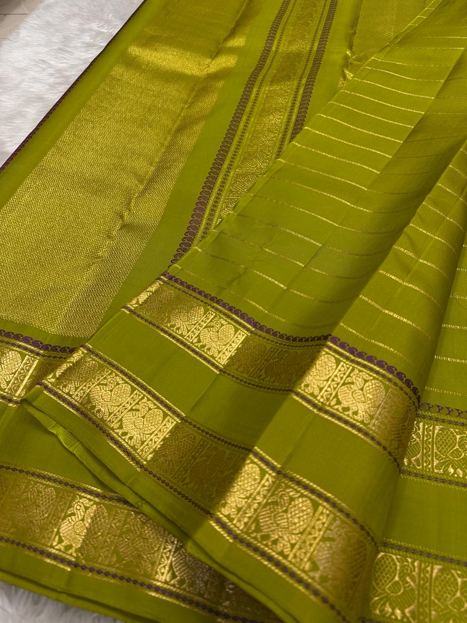 Self-colour rettapet vanasringaram border on lime green Kancheepuram pure silk saree — Idam Living