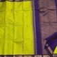 Close view of the exceptionally fine yellow-green checked grid woven across the silk body