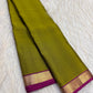 Lime green lightweight Kanjeevaram silk saree with coral pink pallu and gold border, full view