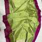 Lime green Pattu Silk Chanderi saree with magenta borders and floral buttas, shown draped.