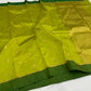 Lime Green Pattu Silk Chanderi saree close view with petite gold and turquoise buttas and wide Forest Green silk border