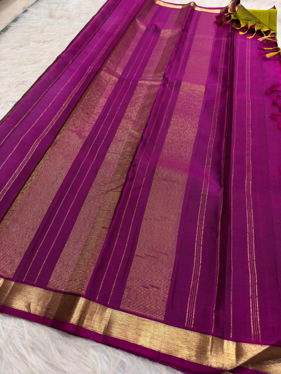 Lime green pure silk Kanjeevaram saree body with gold bands