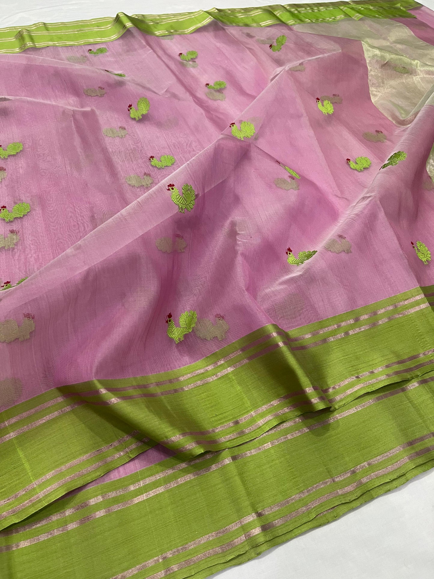 Pastel pink Chanderi silk saree with parrot green zari border detailing