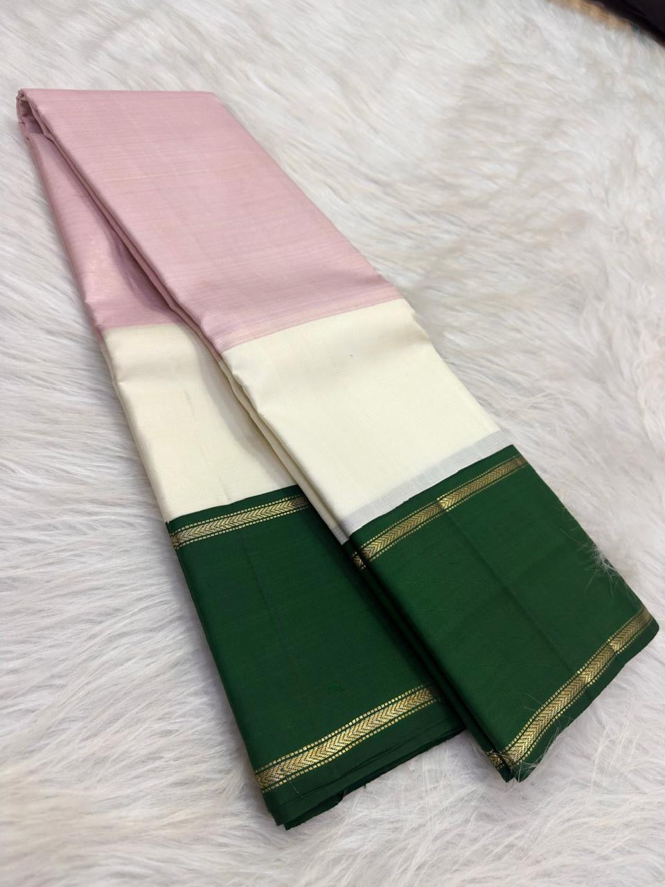 Lotus pink Pure Silk Kancheepuram Korvai saree with temple green border