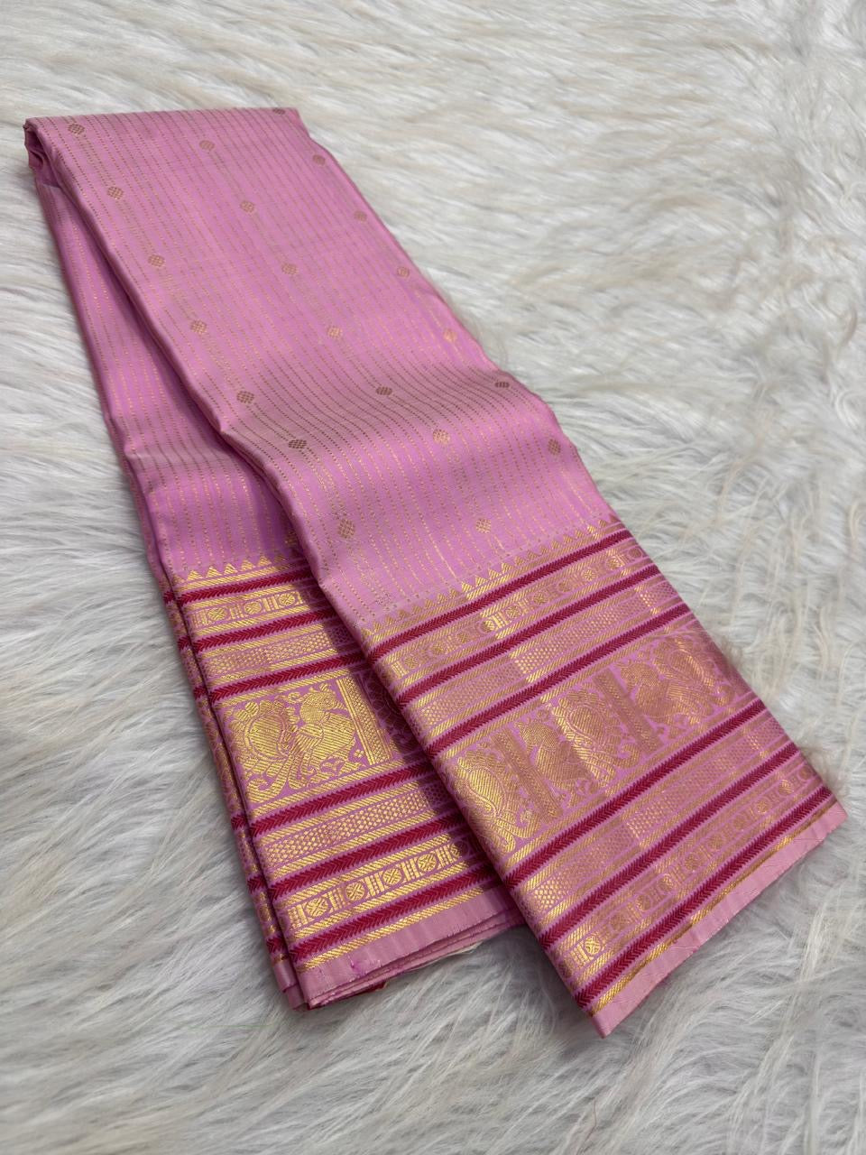 Soft Lotus Pink Pure Silk Kanchipuram Varisaipet saree.