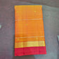 orange Kanchipuram silk saree with ls weave folded view