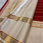 Arakku red Kanchipuram silk saree, Rettapet double-register border with stacked zari stripes and floral zariwork