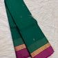 Emerald Green and Vadamalli Magenta lightweight Kanchipuram silk saree, spaced buttas and scrolling floral zari border; zari pattern