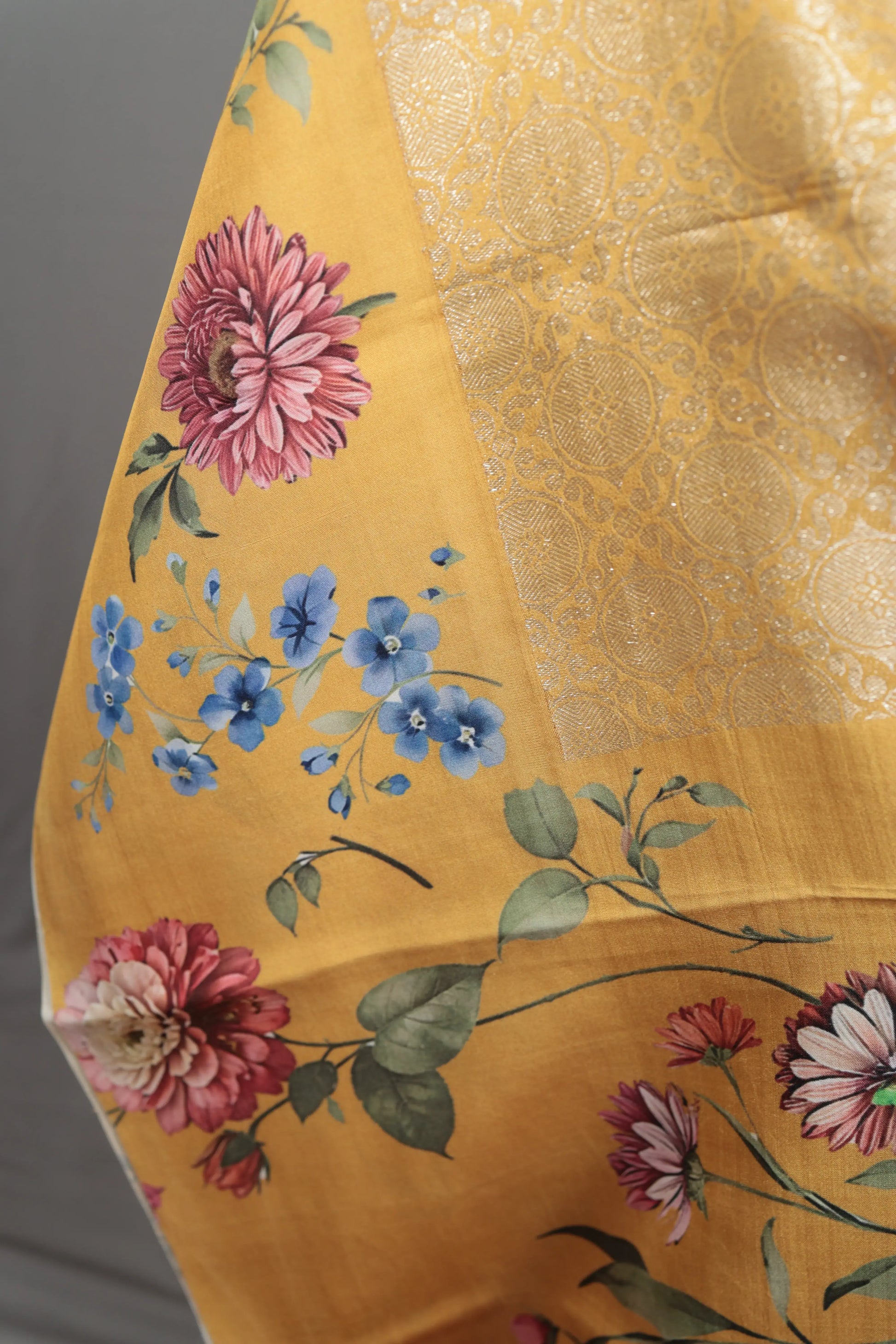 Pure Kanjivaram silk saree in warm yellow with painterly gardenia floral print and elegant zari detailing