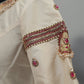 Beige sleeve with intricate jewelry design on a plain background