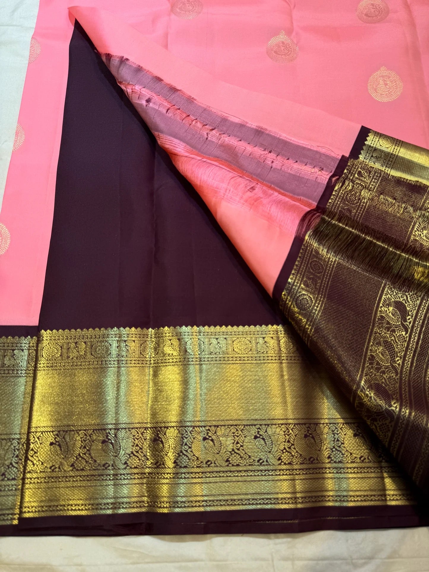 Blush pink Kanchi Pattu Korvai silk saree with antique gold zari border, luxury drape