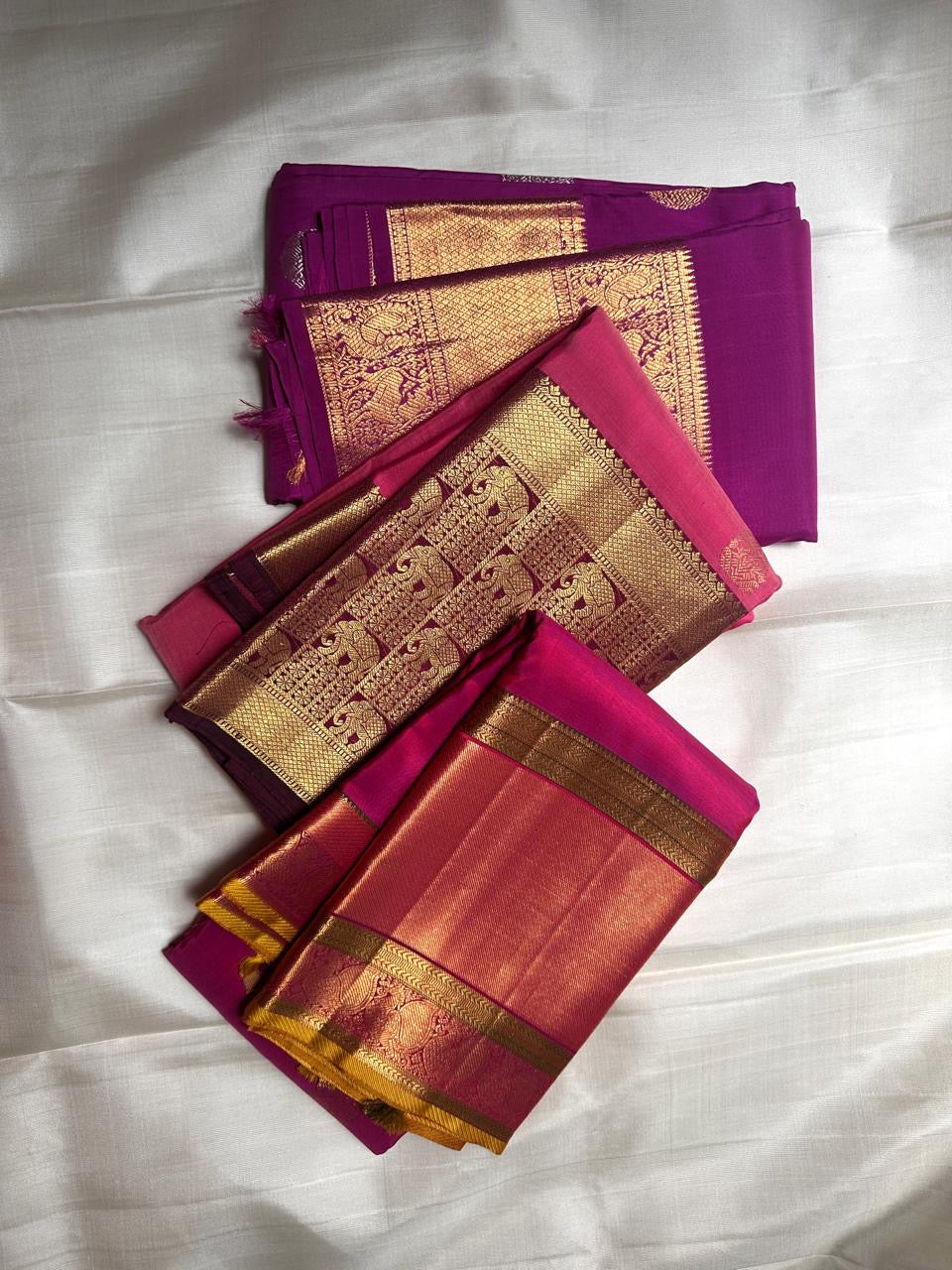 Luxury purple Kanjeevaram silk saree with peacock motif weaving