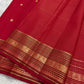 Red Kanchipuram silk saree draped showing vairaoosi weave and gold zari varisaipet border Idam Living